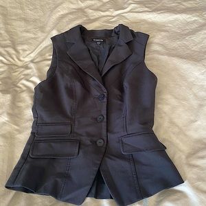 Black fitted vest from Bebe. Size small